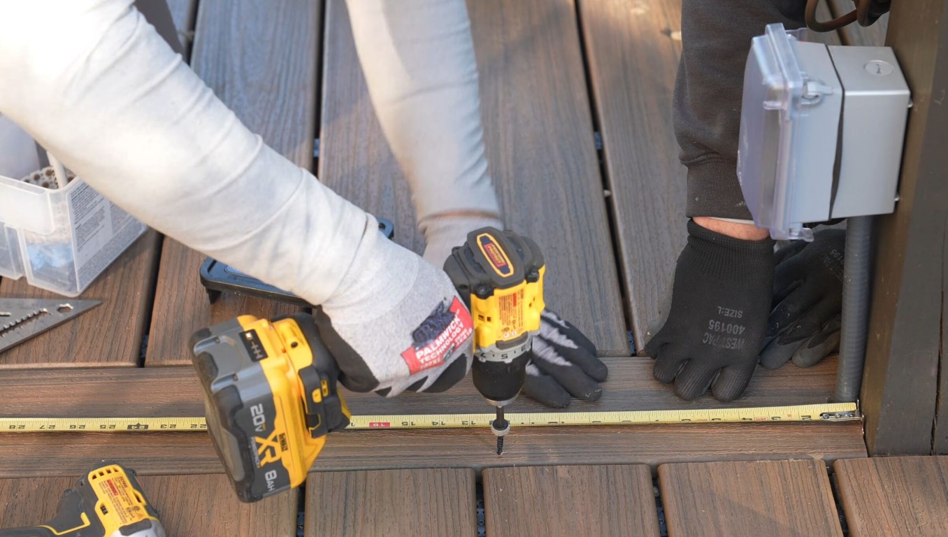 Professional deck builder using quality tools for precise deck construction in Hemet, CA