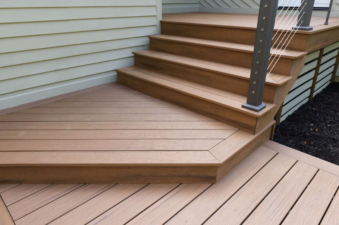 Close-up of quality deck stairs and cable railing construction details in Hemet, CA